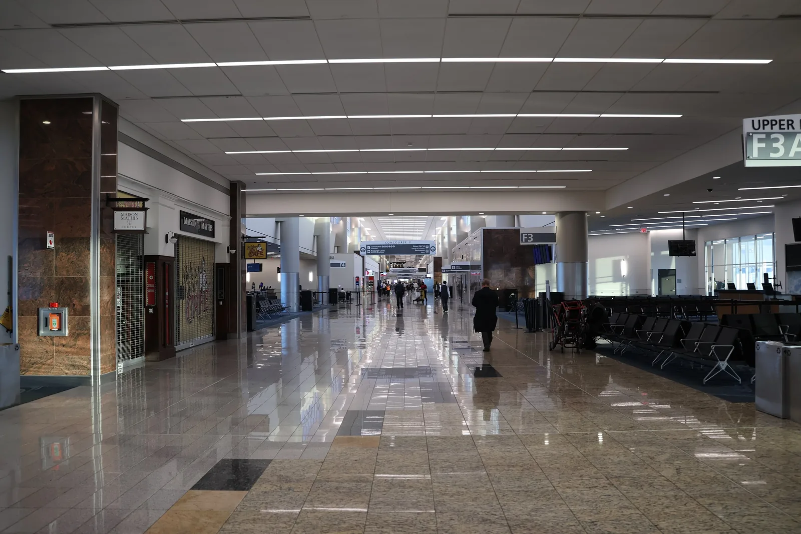 A concourse at Hartsfield-Jackson Atlanta, looking down the moving walkway.