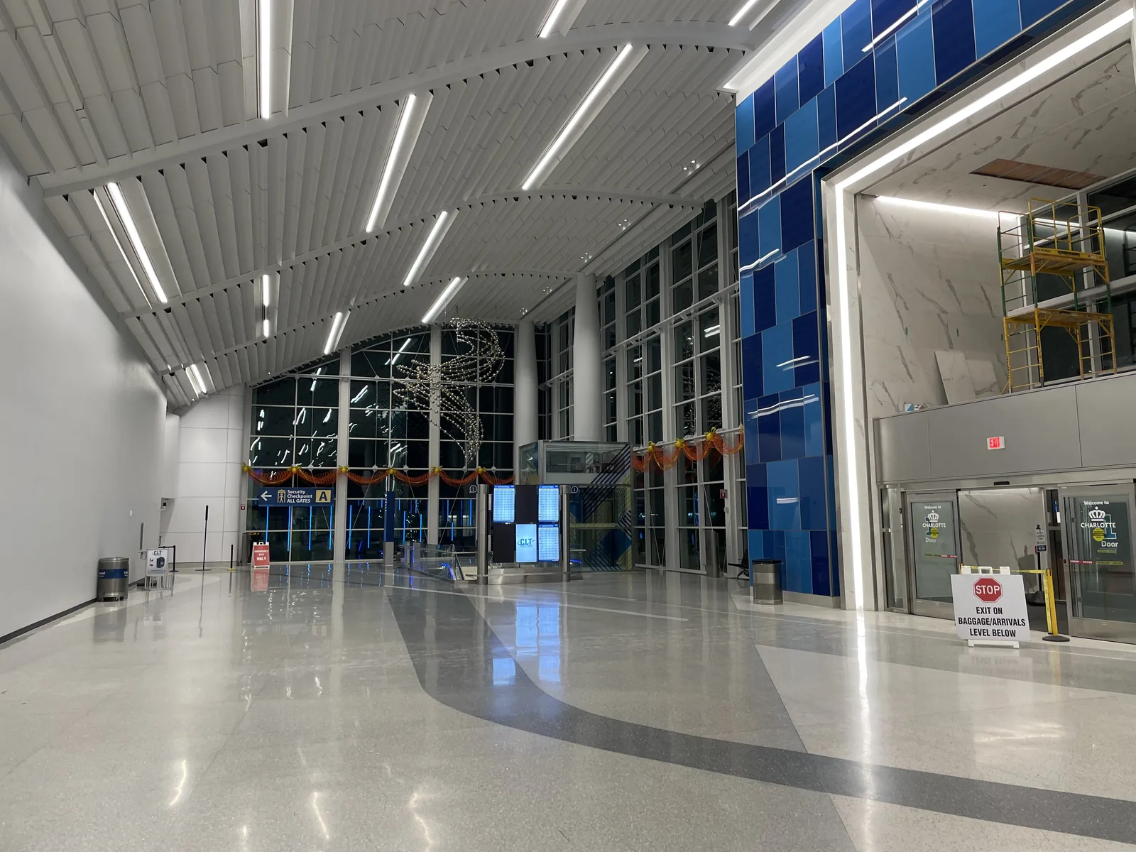A glass-walled concourse at Charlotte Douglas.