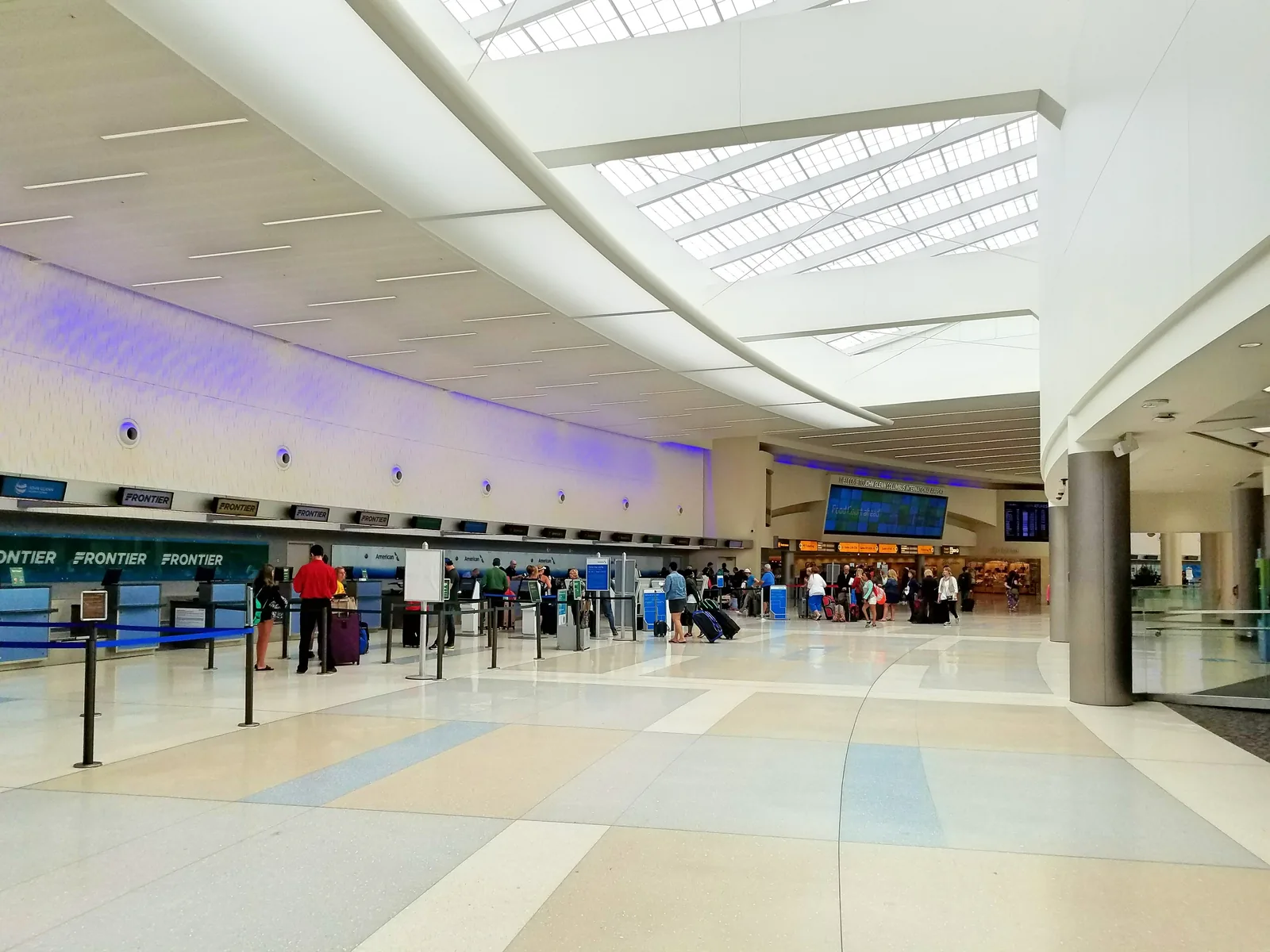 The ticketing hall at John Glenn Columbus International Airport, with the check-in counters along the far wall.