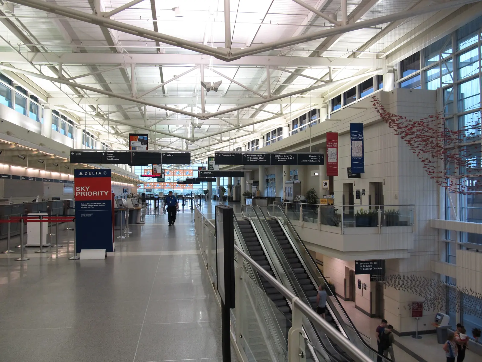 The ticketing hall at Chicago Midway, under its glass roof.