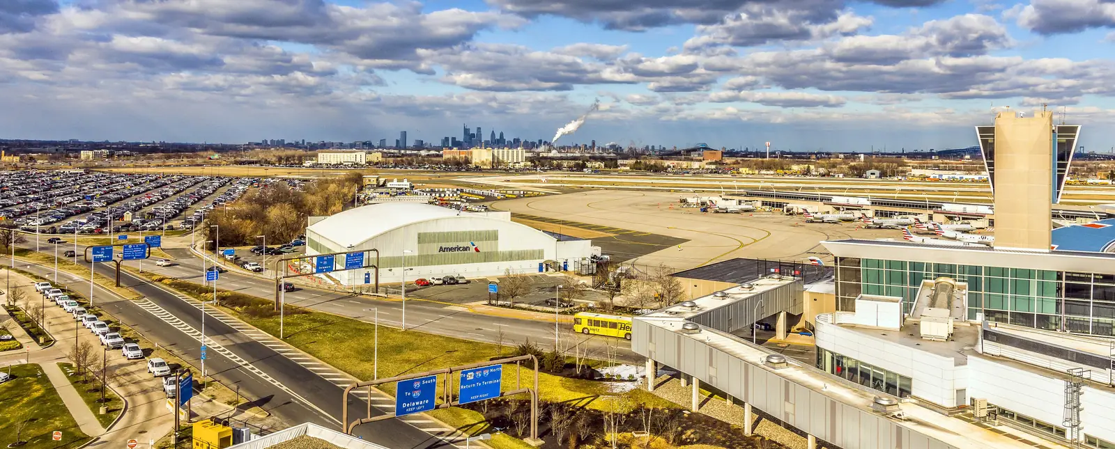 Philadelphia International from above, with the city skyline behind it.