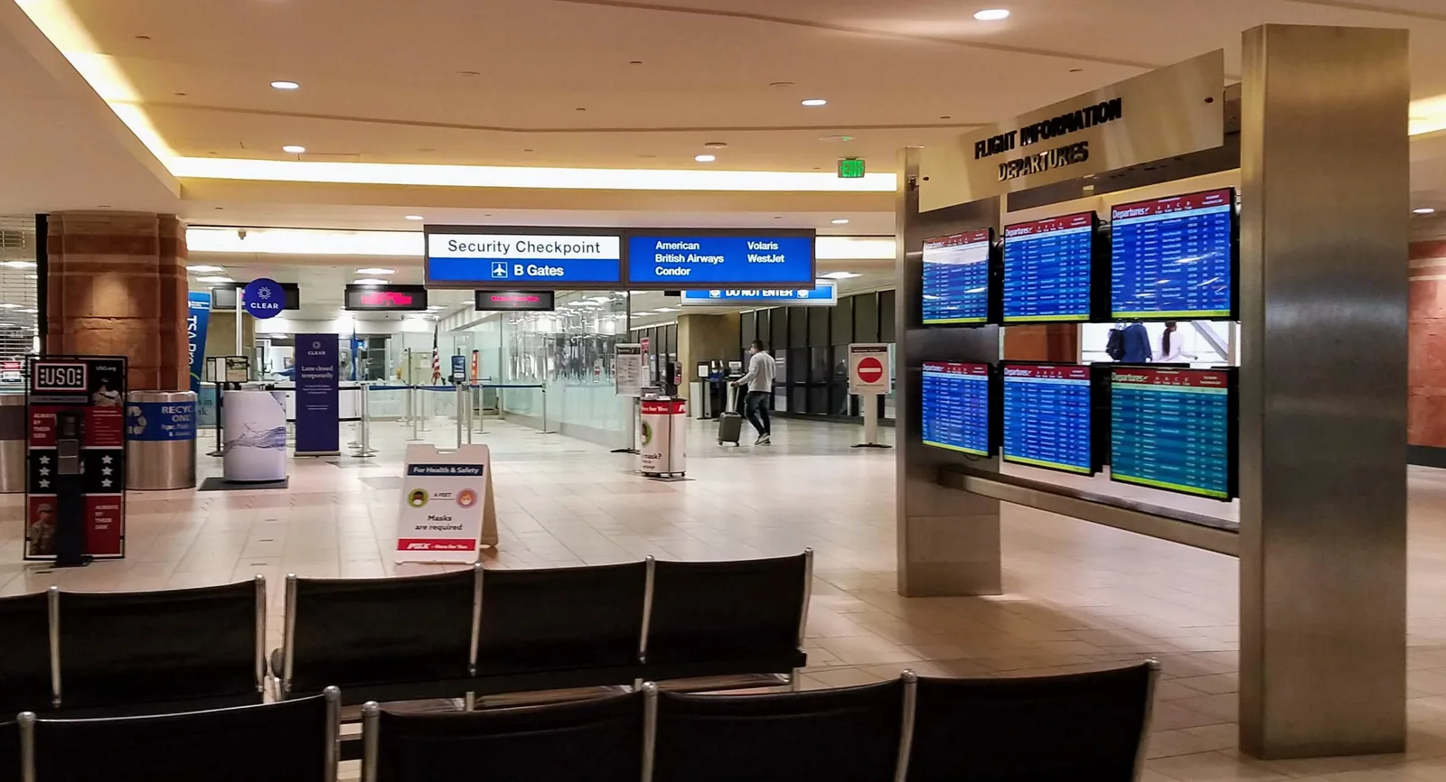 The flight information boards near the checkpoint at Phoenix Sky Harbor.