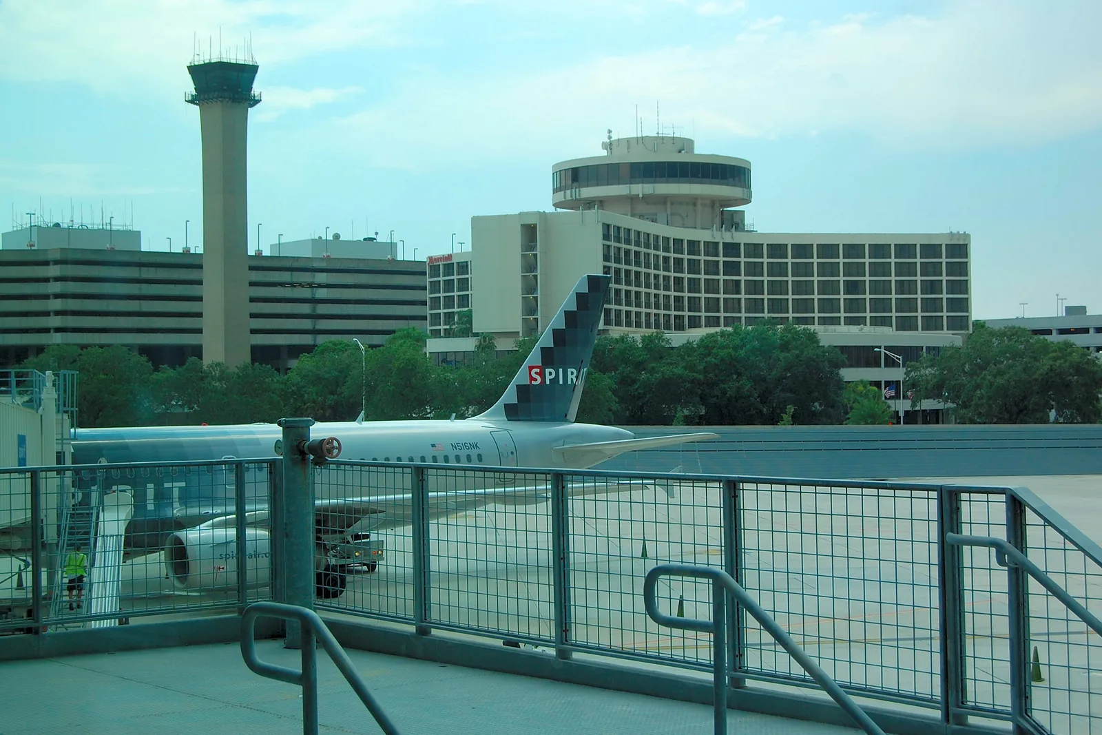 Tampa International's round terminal seen across the water.