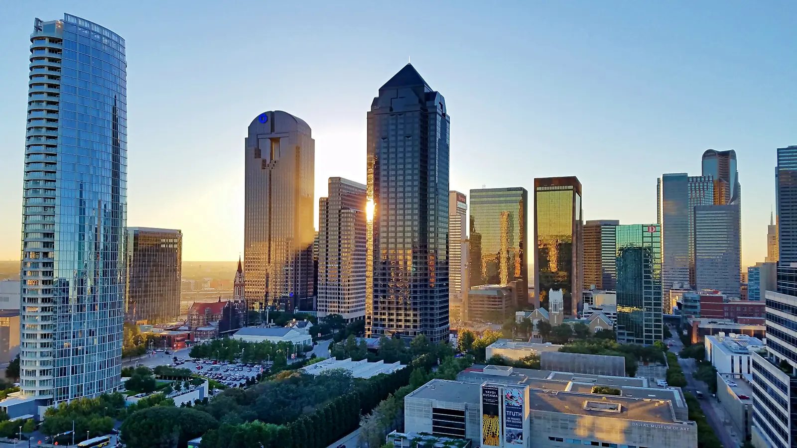 The downtown Dallas skyline from the Arts District at golden hour.