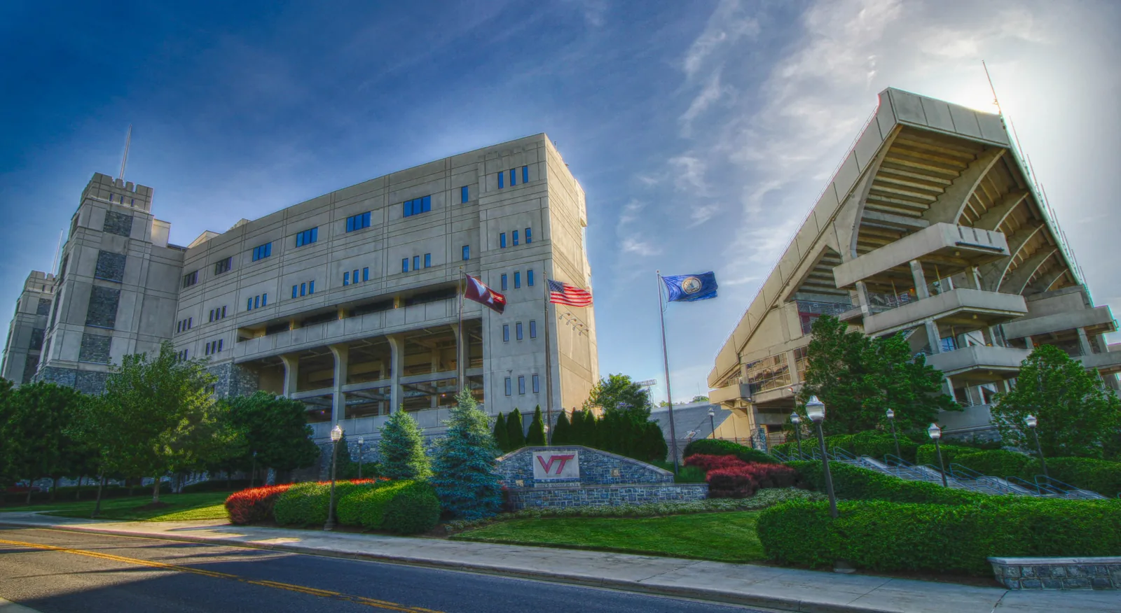 The southwest corner of Lane Stadium in Blacksburg, with the west stand and the VT sign at the entrance.