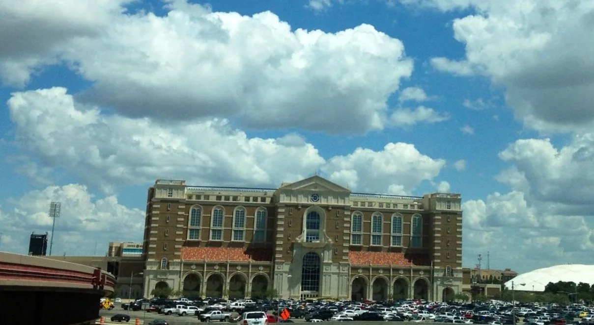 The west side building at Galaxy Stadium in Lubbock, with its arched brick facade.