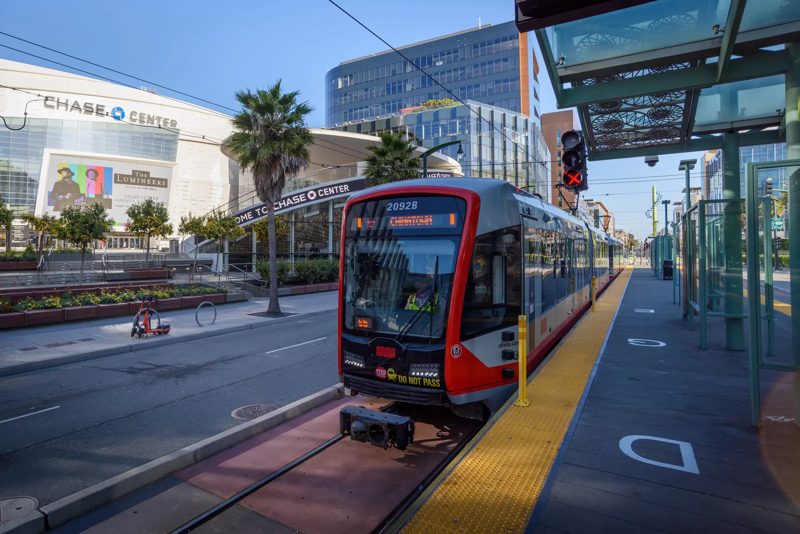 The UCSF/Chase Center Muni platform on the T Third, with the arena behind it.