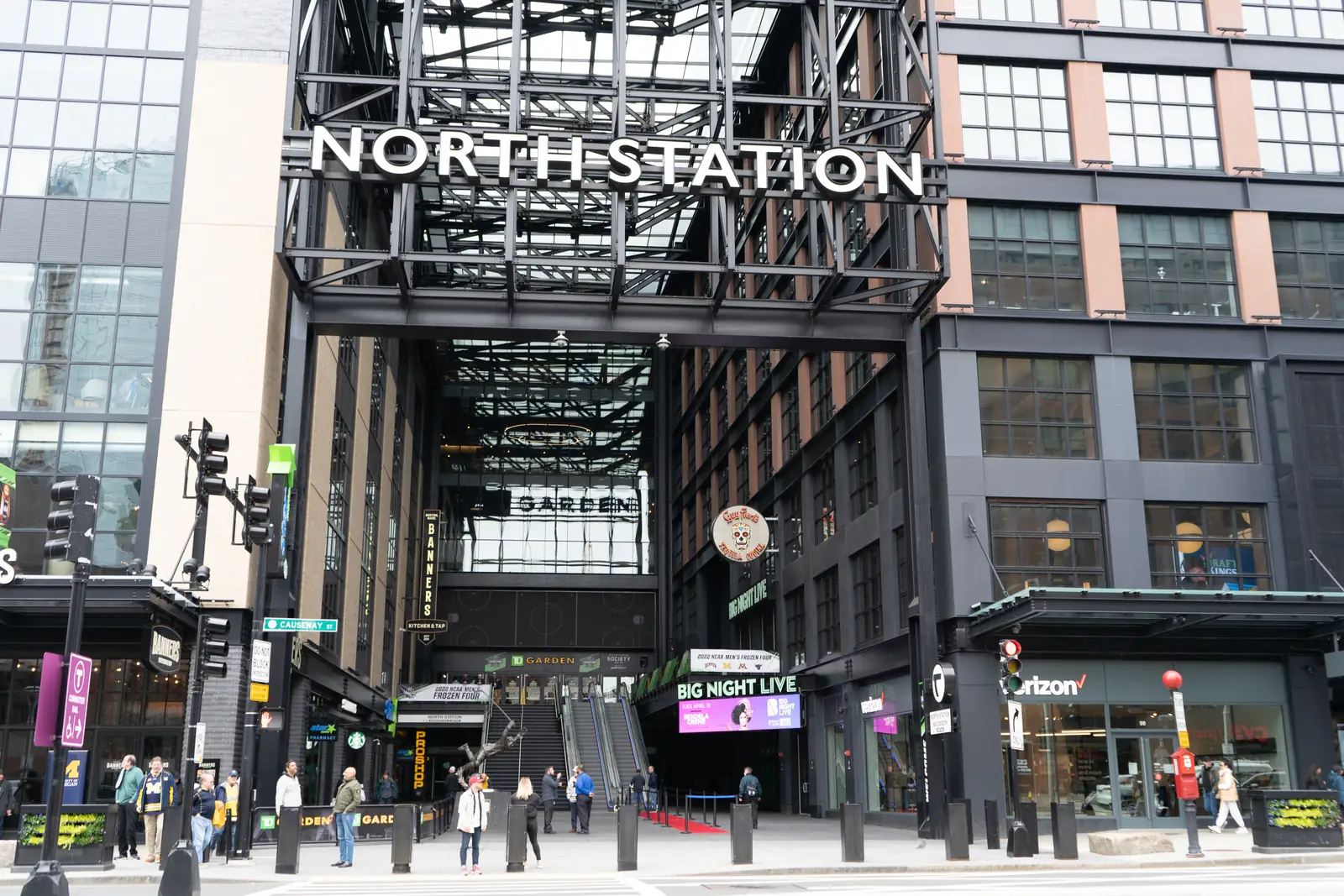 The Causeway Street entrance to North Station, the station name above the doors and the Garden sign beside it.