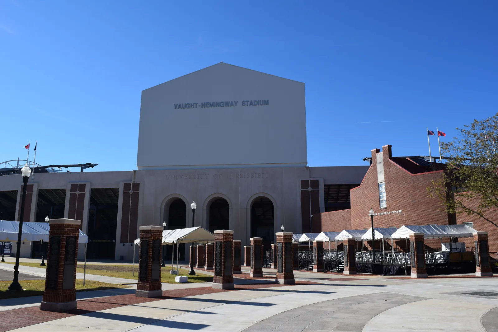 The arched entrance and lettered facade of Vaught-Hemingway Stadium in Oxford, Mississippi.