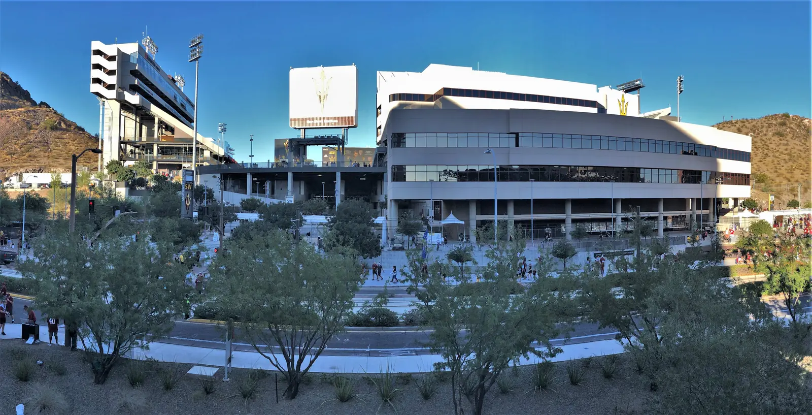 Mountain America Stadium in Tempe, Arizona, with Tempe Butte rising behind it.