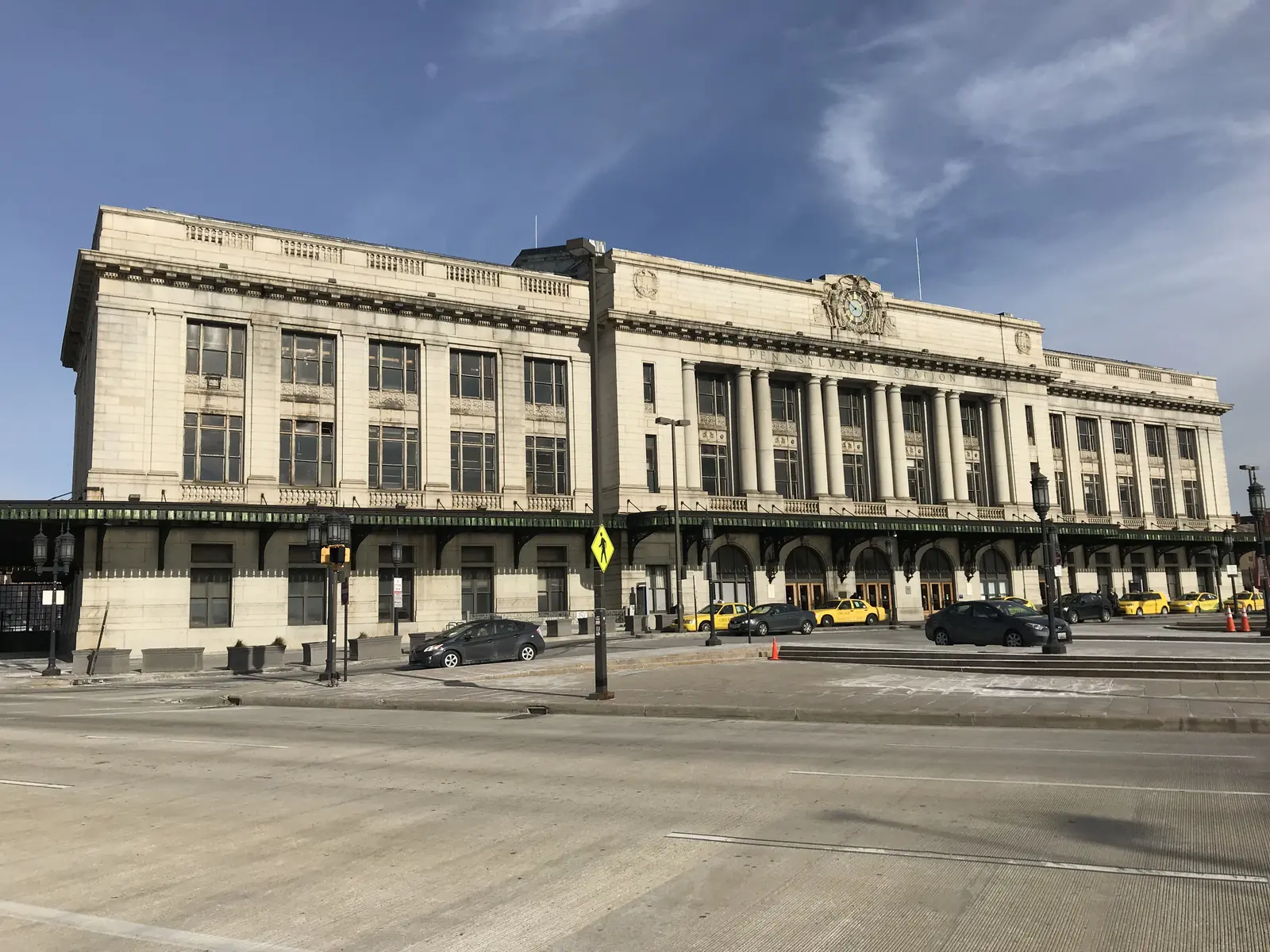 Baltimore Penn Station's 1911 Beaux-Arts facade, seen from the street.