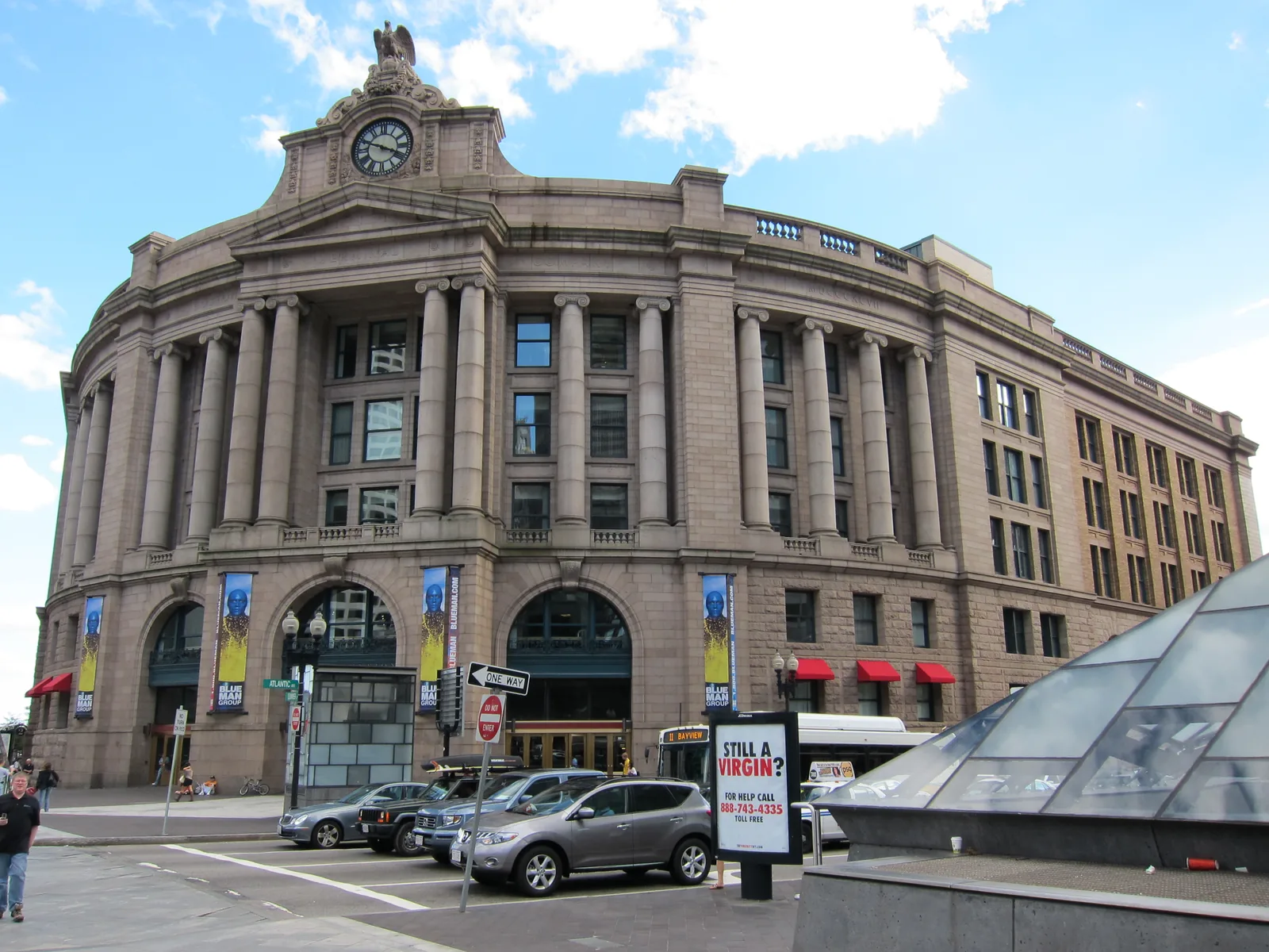 The curved granite front of Boston South Station, seen from Atlantic Avenue.